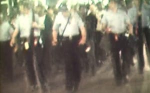 Frame from news film clip of fair housing march, likely the night of August 29, 1967. 