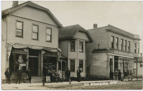 Postcard of post office and tailoring shop in Middleton, Wisconsin, 1909.