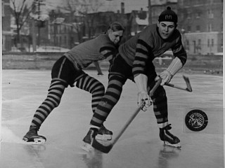 Two hockey players at Marquette University, Milwaukee, 1920-1929. Marquette University Archives.