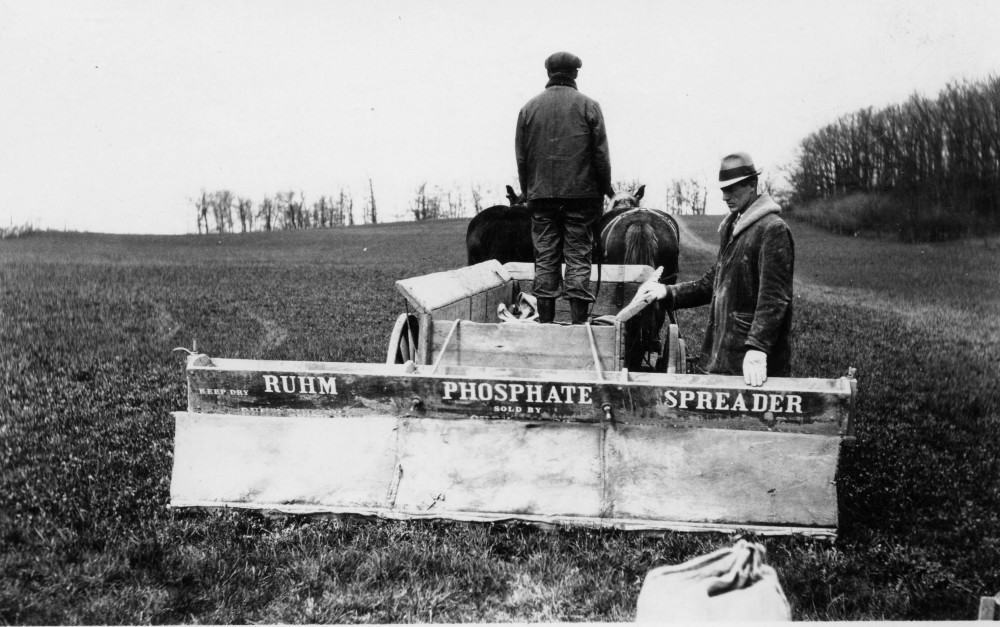 Phosphate spreader pulled by a team of horses.  Cornfalfa Farms collection, New Berlin Historical Society.