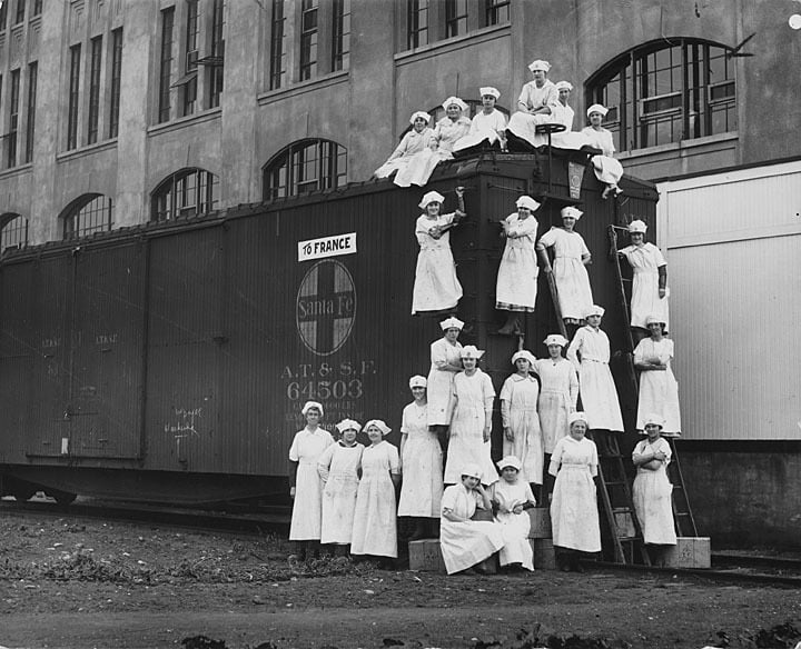 Jiffy-Jell employees posed around and on a train car, Waukesha, 1917. Waukesha County Historical Society.