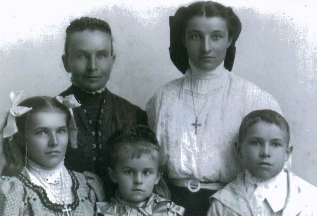 Herman family, 1909 or 1910. Back row: Grandma Bertha, Mary (Savitski). Front row: Rose (Sadowski), Christine (Henk), Stanley.