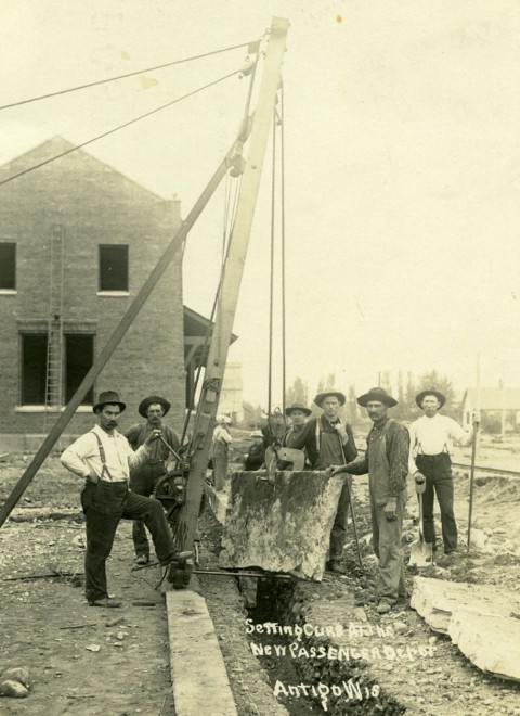 Setting curb at the new passenger depot, Antigo, 1907. Langlade County Historical Society.