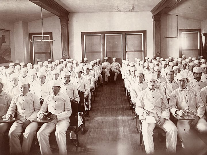 Dairy School students attend a lecture, UW-Madison, 1900-1919. UW-Madison Archives.