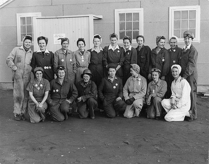 Female employees of Globe Shipbuilding Company in kerchiefs and coveralls, Superior, ca. 1942.  Great Lakes Maritime History Project, Jim Dan Hill Library, UW-Superior.