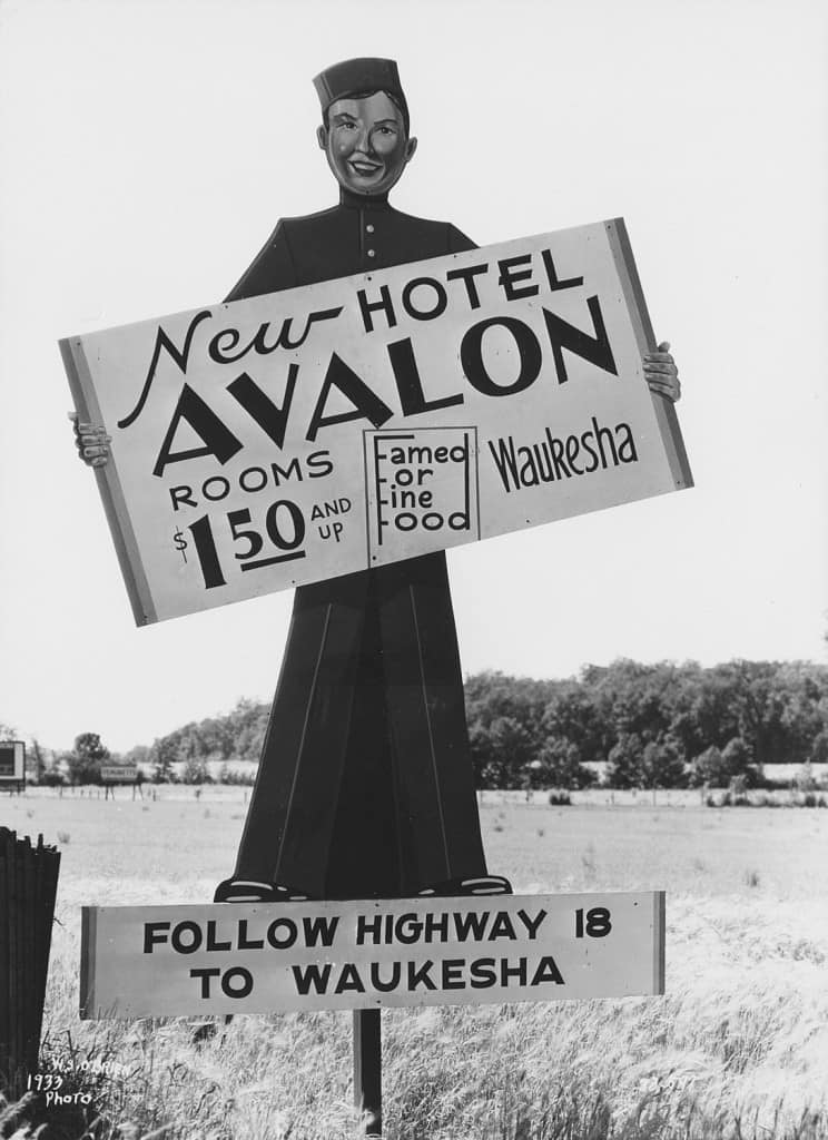 This 1933 billboard for the new Avalon Hotel in Waukesha advertises room rates starting at $1.50. 