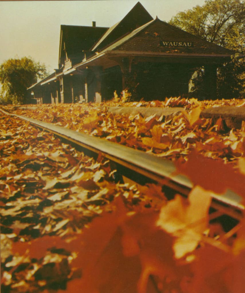 This view of the Wausau railroad depot in autumn was an advertising photograph for the Wausau Insurance Company, 1980-1999. Marathon County Historical Society.