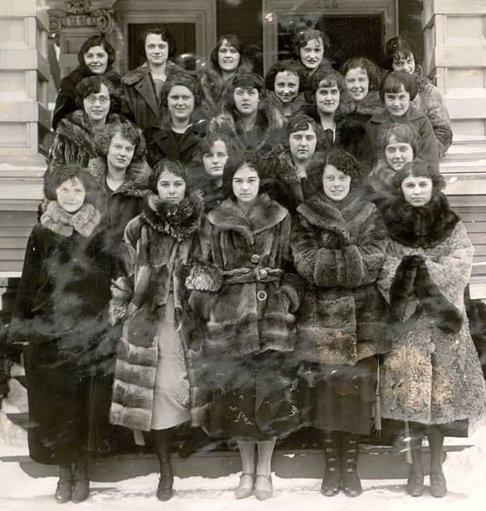 Members of the Sigma Kappa sorority keep warm in stylish fur coats, December 1922. UW-Madison Archives by way of University of Wisconsin Digital Collections. 
