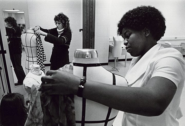 Students work with fabric and dress forms in a clothing construction class, 1979. University of Wisconsin-Stout.