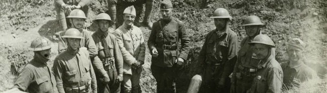 Soldiers pose with a mortar in a trench in the Brittany region of France. Langlade County Historical Society.