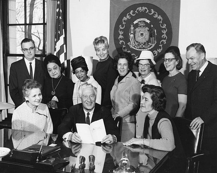 Sparta native Kathryn F. Clarenbach, a professor of political science at the University of Wisconsin-Madison, was one of the 28 women who participated in the founding meeting of NOW in June 1966. This photo shows Professor Clarenbach, seated on the right, with Wisconsin Governor Robert Knowles and the Committee on the Status of Women Midwest Conference in 1967. UW-Madison Archives by way of University of Wisconsin Digital Collections.