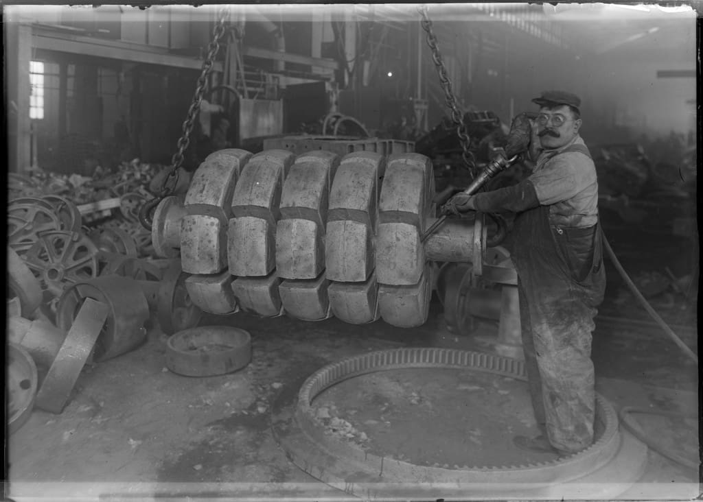 Man working with steel castings inside Maynard Electric Steel Casting Company, 1929. University of Wisconsin-Milwaukee Libraries.
