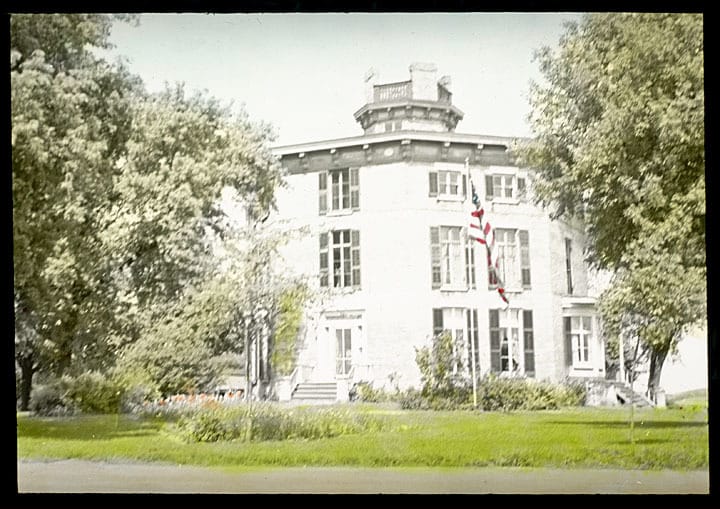 Octagon house in Watertown, constructed in 1853. This image, a colored glass lantern slide, dates to 1938. C. E. Dewey Lantern Slide Collection, Kenosha History Center.