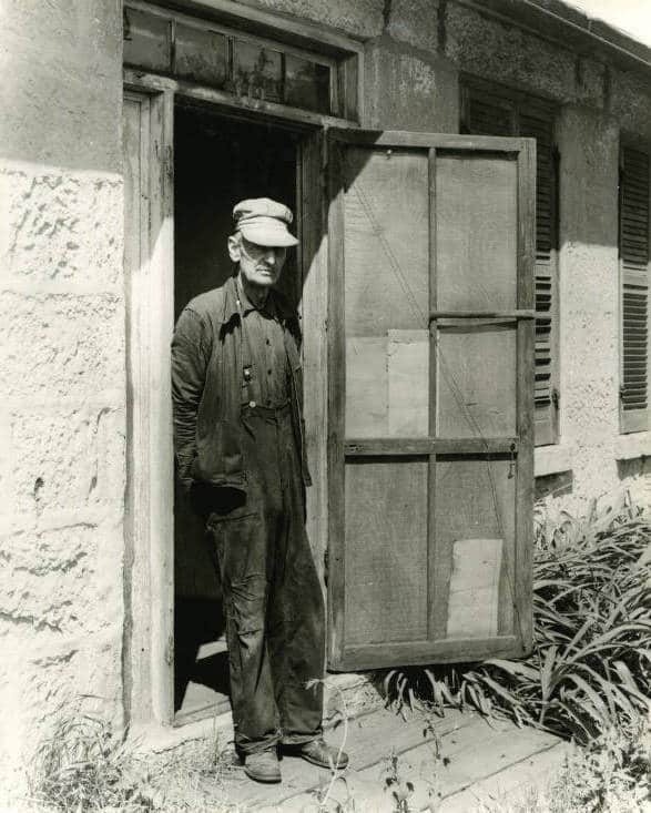 Peter Kessler at the door of his stone house on Jail Alley. Mineral Point Library Archives.