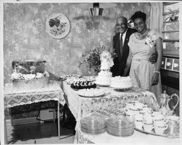 Carson and Bea Gulley at their 25th wedding anniversary party in their new home in the Crestwood sub-division. Wisconsin Historical Society.