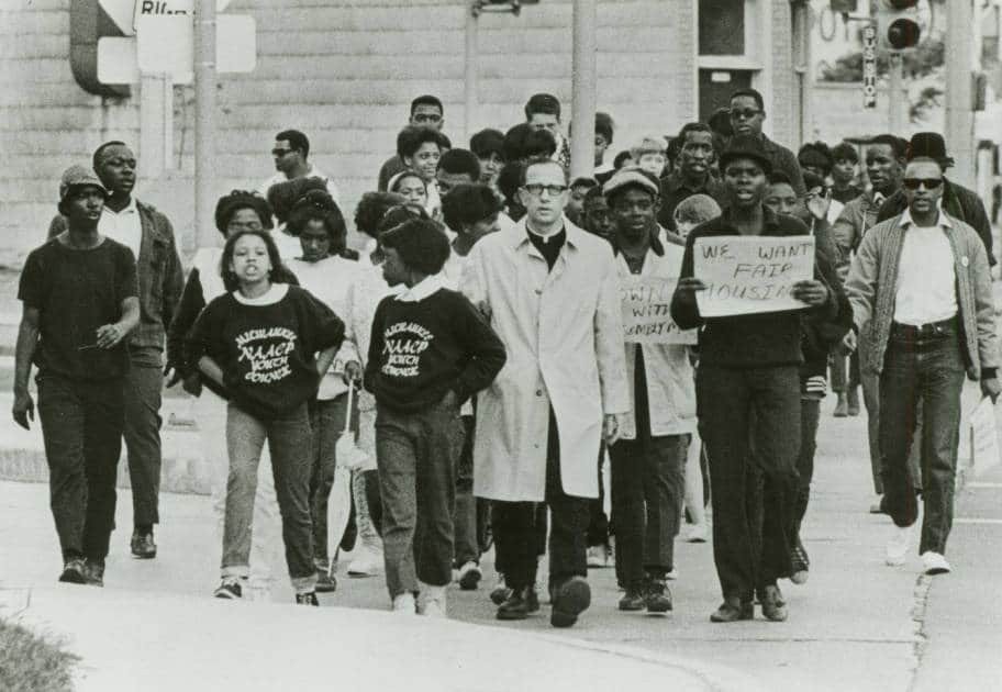 Father James Groppi and members of the NAACP Youth Council march in support of Vel Phillips' Open Housing bill, 1967. Milwaukee Public Library.