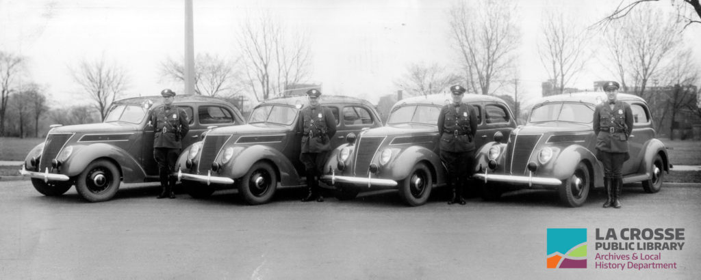 La Crosse County Traffic Police in Riverside Park ca. 1930-40s; cp013-001, Nick Passe Photographs, CP 013, La Crosse Public Library Archives, La Crosse, Wisconsin.