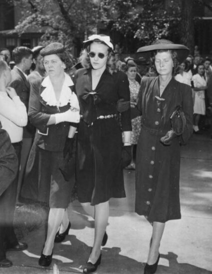 Marge, Dora (Dick's mother), and Marge's mother walking together at Dick's funeral