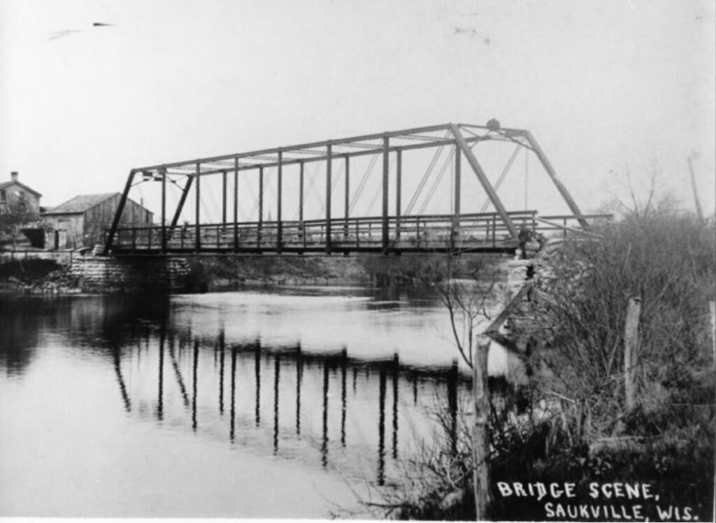 Bridge crossing the Milwaukee River in Saukville, Wisconsin. Undated.