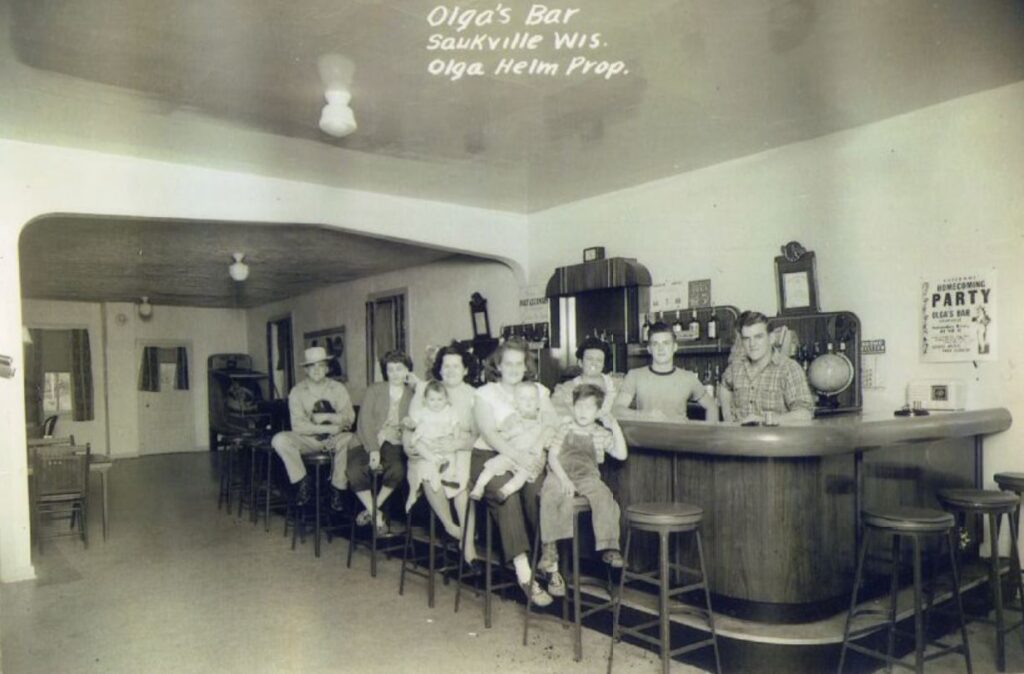 File this under: Say you're from Wisconsin, without saying you're from Wisconsin.  Olga's Bar, located in Saukville, Wisconsin. Olga Helm's Property. 1945.