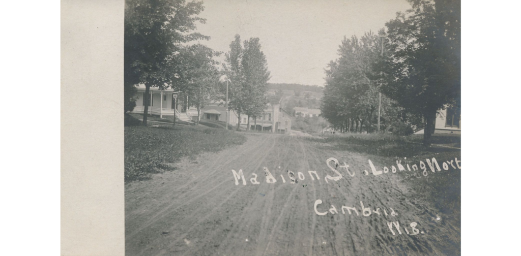 Mary Street looking North, Cambria, Wis. postcard, ca. 1906. Street view showing Mary Street.