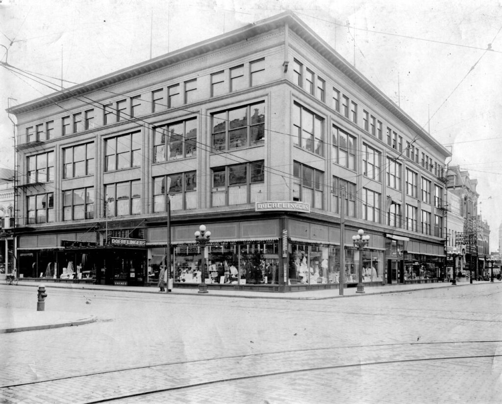 Image of the Doerflingers building circa 1910. Main Street - 400 Block.