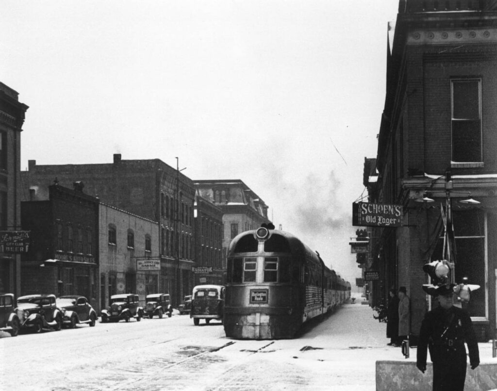 Image of the Burlington Route Streamliner passenger train heading south on Second Street, circa 1930s. Donated by Patty Fellows. 2nd Street South- 100 block