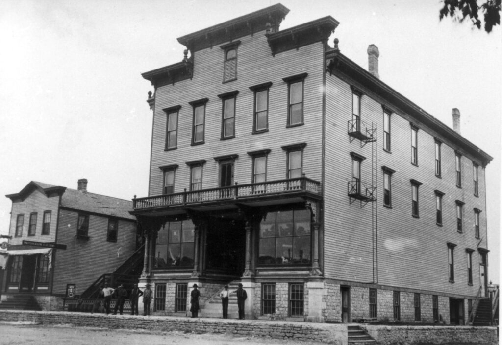 The Charles H. Noll building (1858-1921) before the fire of July 2, 1898. The building housed a furniture store, funeral home, and dance hall.