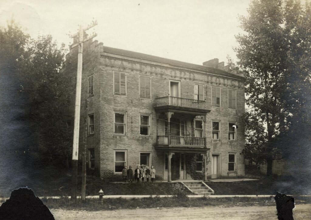 In 1846, Sam C. Russ, brother-in-law to Samuel Chapman, constructed the Waterford House on the northeast corner of the Jefferson Street and West Main Street intersection. Located on the Old Plank Road that followed Jefferson Street through the village, the Waterford House served as a tavern, hotel and a place to dine.