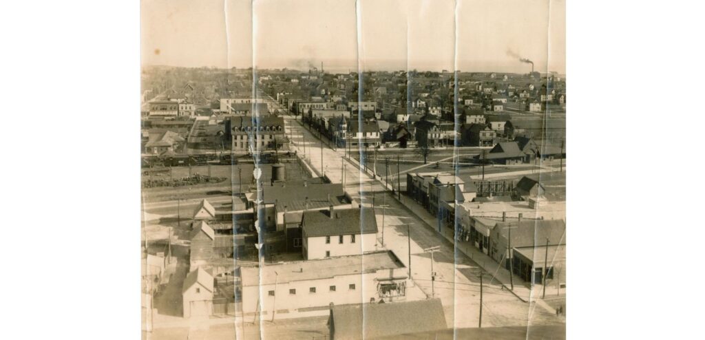 Aerial View looking east of Milwaukee Avenue, 1915. The South Milwaukee Depot is seen on the right edge of the picture. This picture was taken from the city water tower.